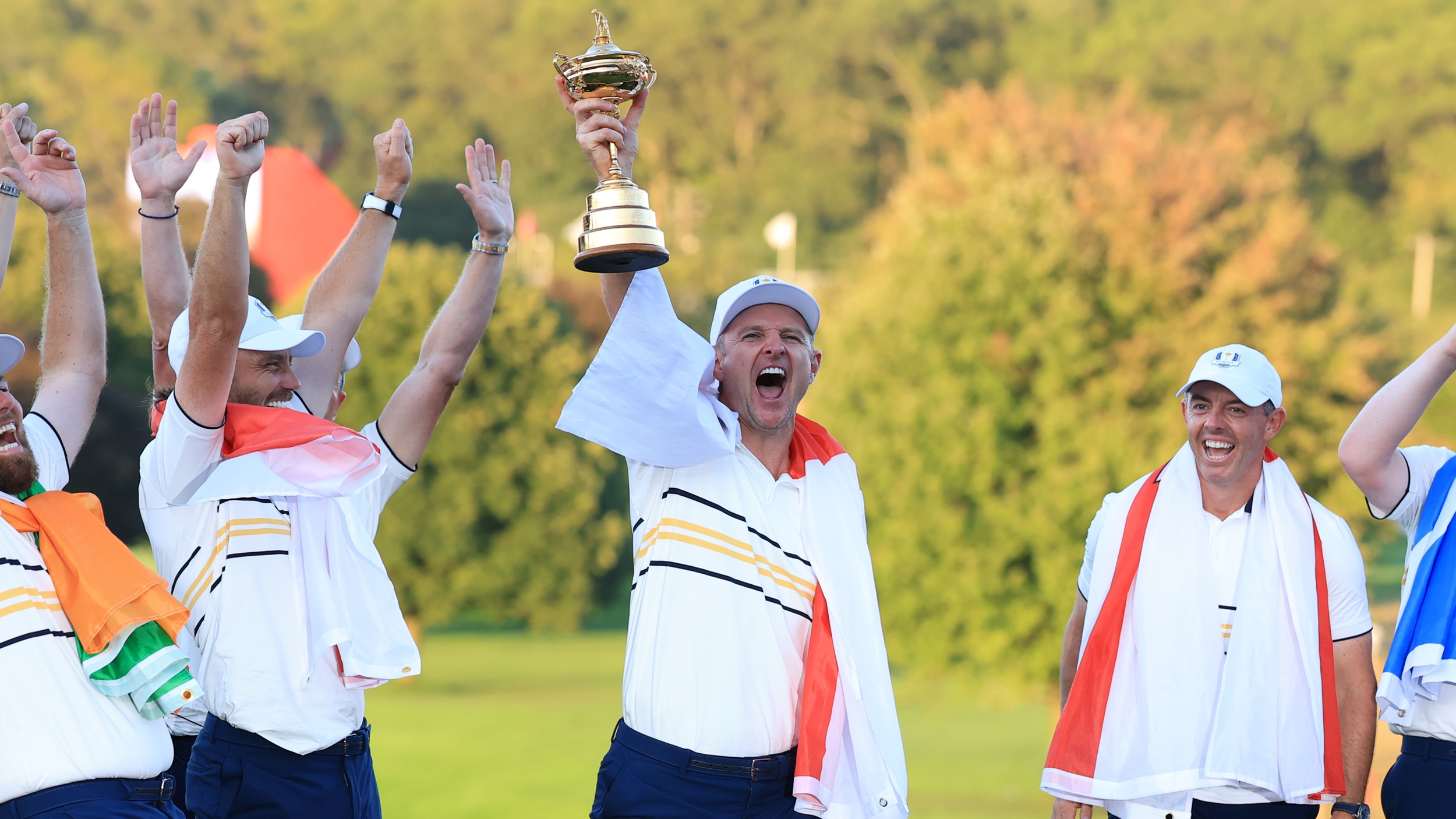 Justin Rose pictured lifting the Ryder Cup at Bethpage Black in 2025