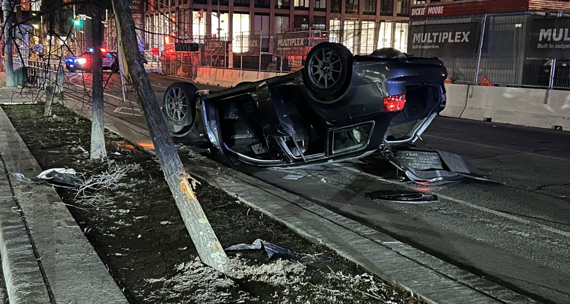 Police investigating vehicle rollover crash near Distillery District