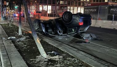 Police investigating vehicle rollover crash near Distillery District