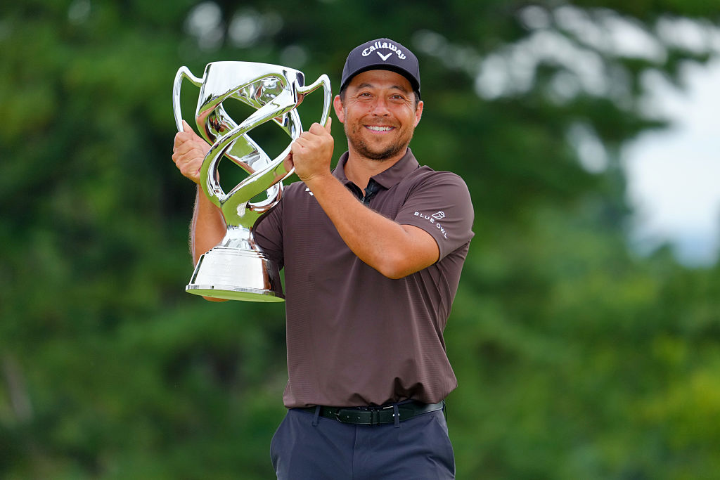 YOKOHAMA, JAPAN - OCTOBER 12: Xander Schauffele of the United States poses with the trophy following the final round of the Baycurrent Classic Presented by LEXUS at Yokohama Country Club on October 12, 2025 in Yokohama, Kanagawa, Japan. (Photo by Yoshimasa Nakano/Getty Images)
