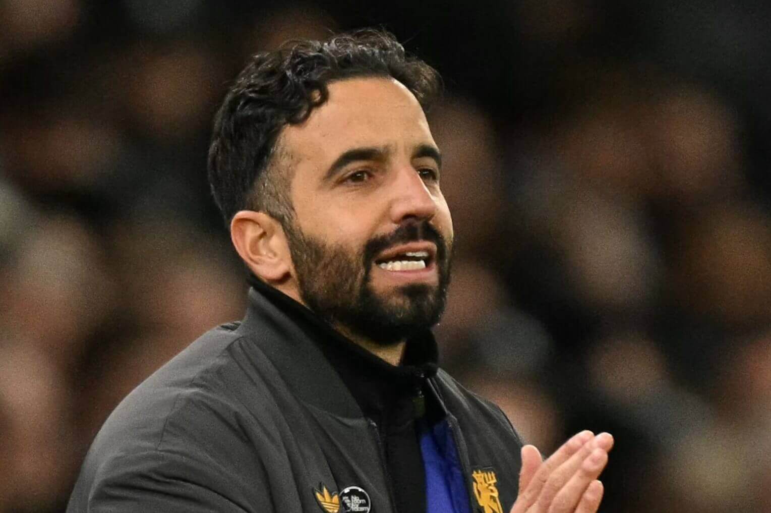 Manchester United head coach Ruben Amorim gestures during a match against Brighton & Hove Albion.