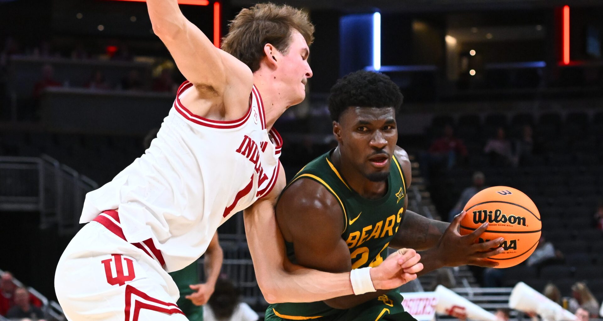 Baylor guard Tounde Yessoufou (right) advances the ball as Indiana forward Reed Bailey (left) defends in the second half of a game at Gainbridge Fieldhouse on Oct. 26 in Indianapolis.