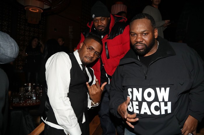 Rappers Nas, Ghostface Killah, and Raekwon pose for a picture at Alicia Keys' birthday party. 