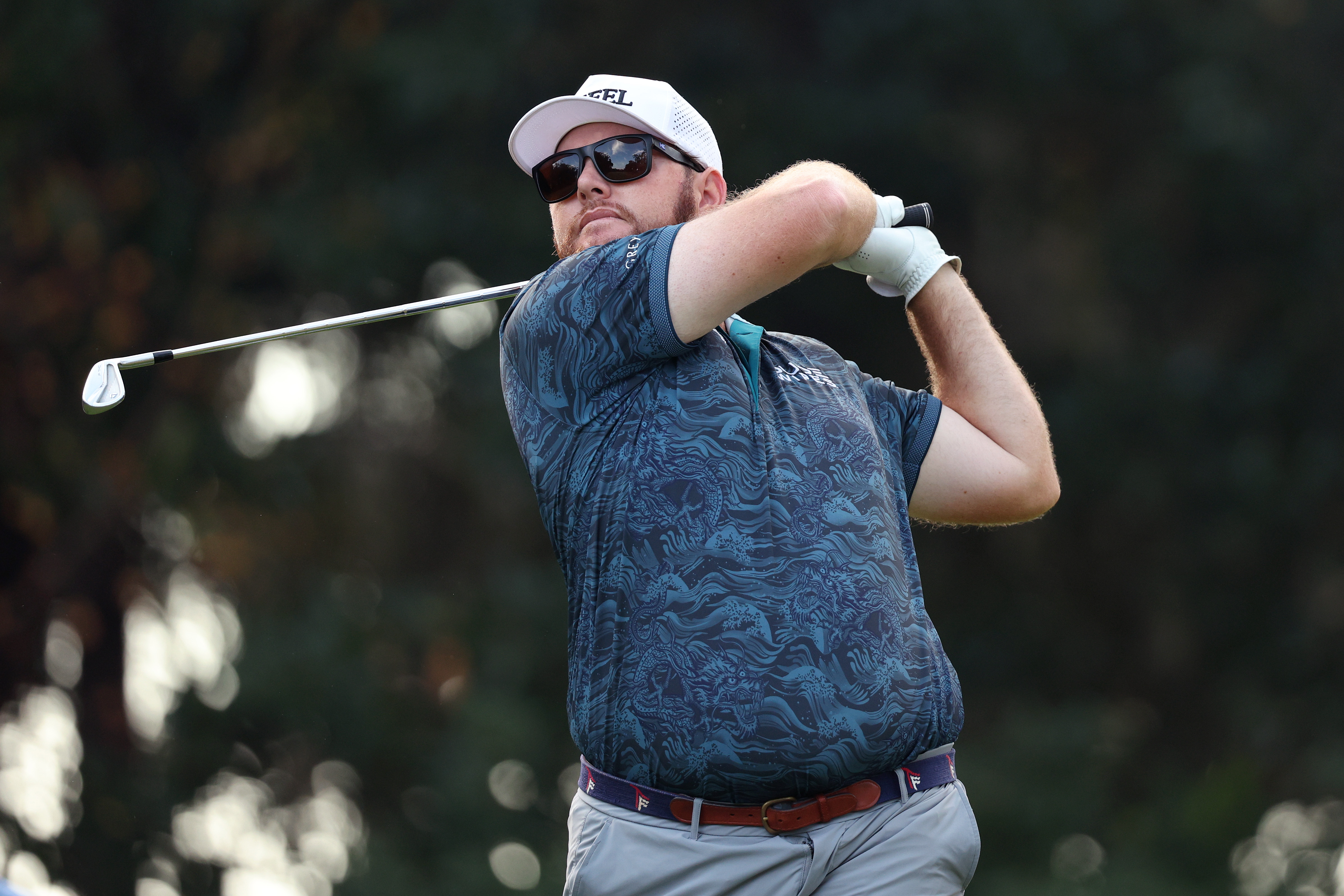 Harry Higgs hits an iron shot