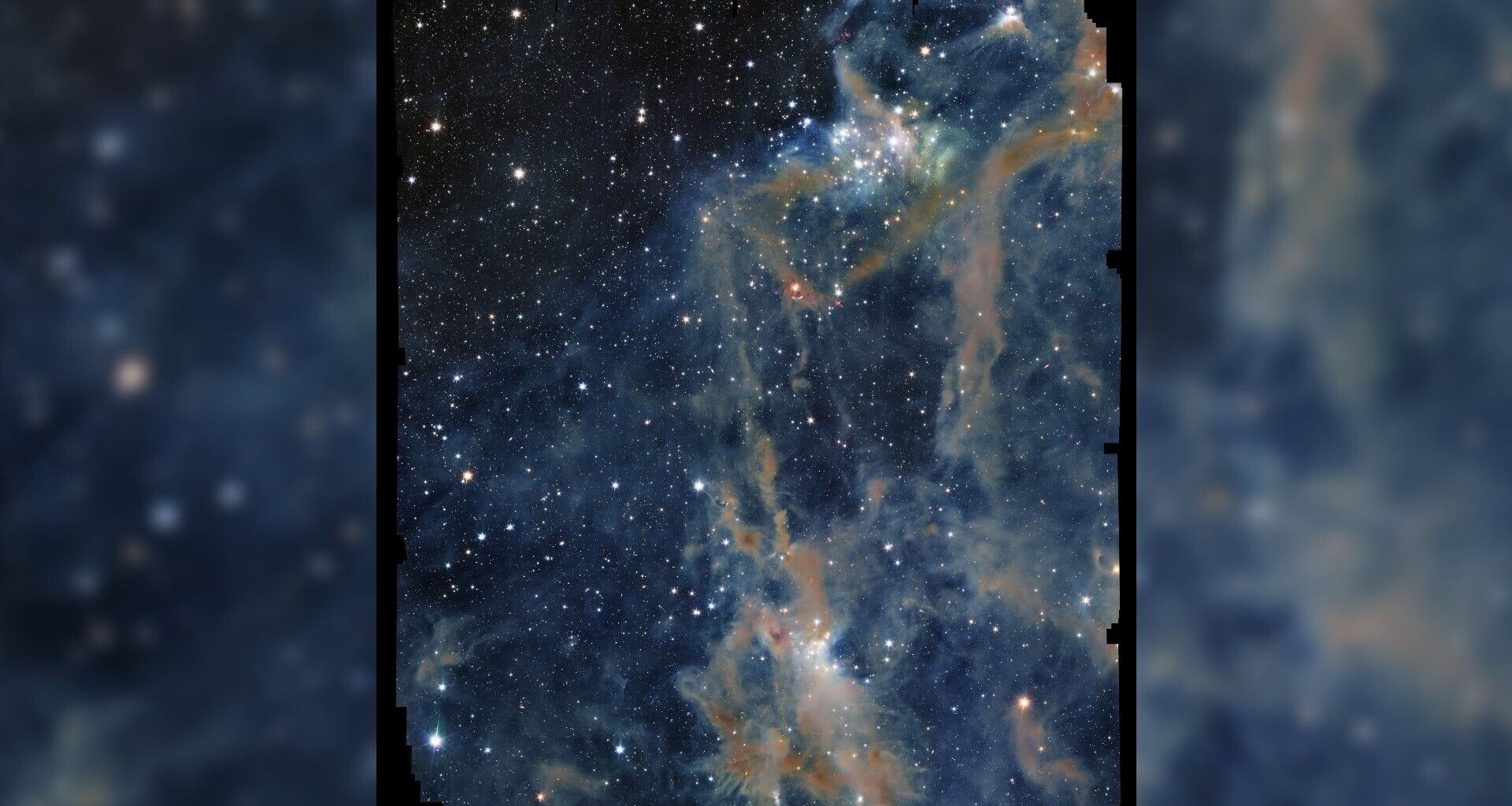 The focus of the image is a portion of LDN 1641, an interstellar nebula in the constellation of Orion. In this view, a deep-black background is sprinkled with a multitude of dots (stars) of different sizes and shades of bright white. Across the sea of stars, a web of fuzzy tendrils and ribbons in varying shades of orange and brown rises from the bottom of the image towards the top-right like thin coils of smoke.