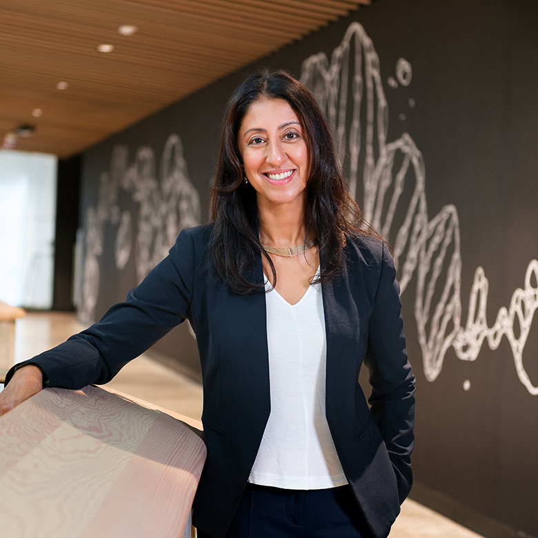 Photo of Dr. Sharmila Anandasabapathy standing inside the Gordon B. Shrum Building.