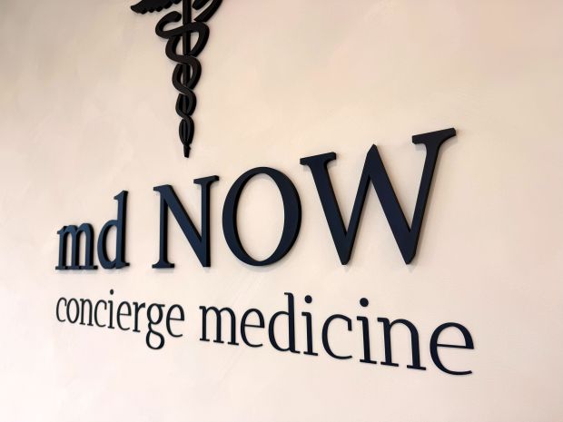 Sign for mdNOW concierge medicine. (Photo courtesy of Melissa Heckscher)