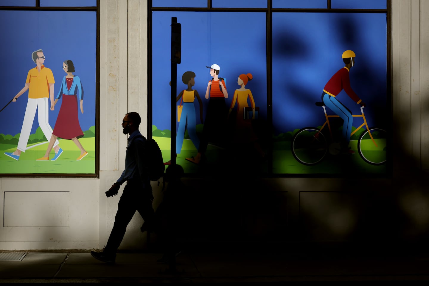 A pedestrian passed through Post Office Square on Congress Street in Boston.