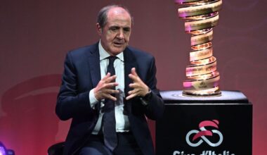 Director of the Giro d'Italia, Mauro Vegni speaks next to the the "Trofeo Senza Fine" (Endless Trophy) race winner's trophy during the presentation of the 2023 Giro d'Italia cycling race on October 17, 2022 in Milan. (Photo by Marco BERTORELLO / AFP)