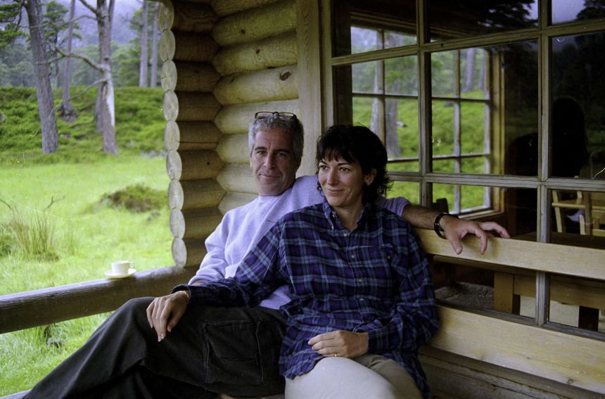 This undated trial evidence image obtained December 8, 2021, from the US District Court for the Southern District of New York shows British socialite Ghislaine Maxwell and US financier Jeffrey Epstein in Queen's log cabin at Balmoral.