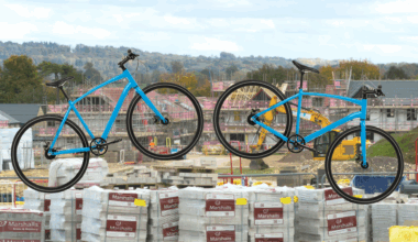 Two bikes layed over a housing development building site