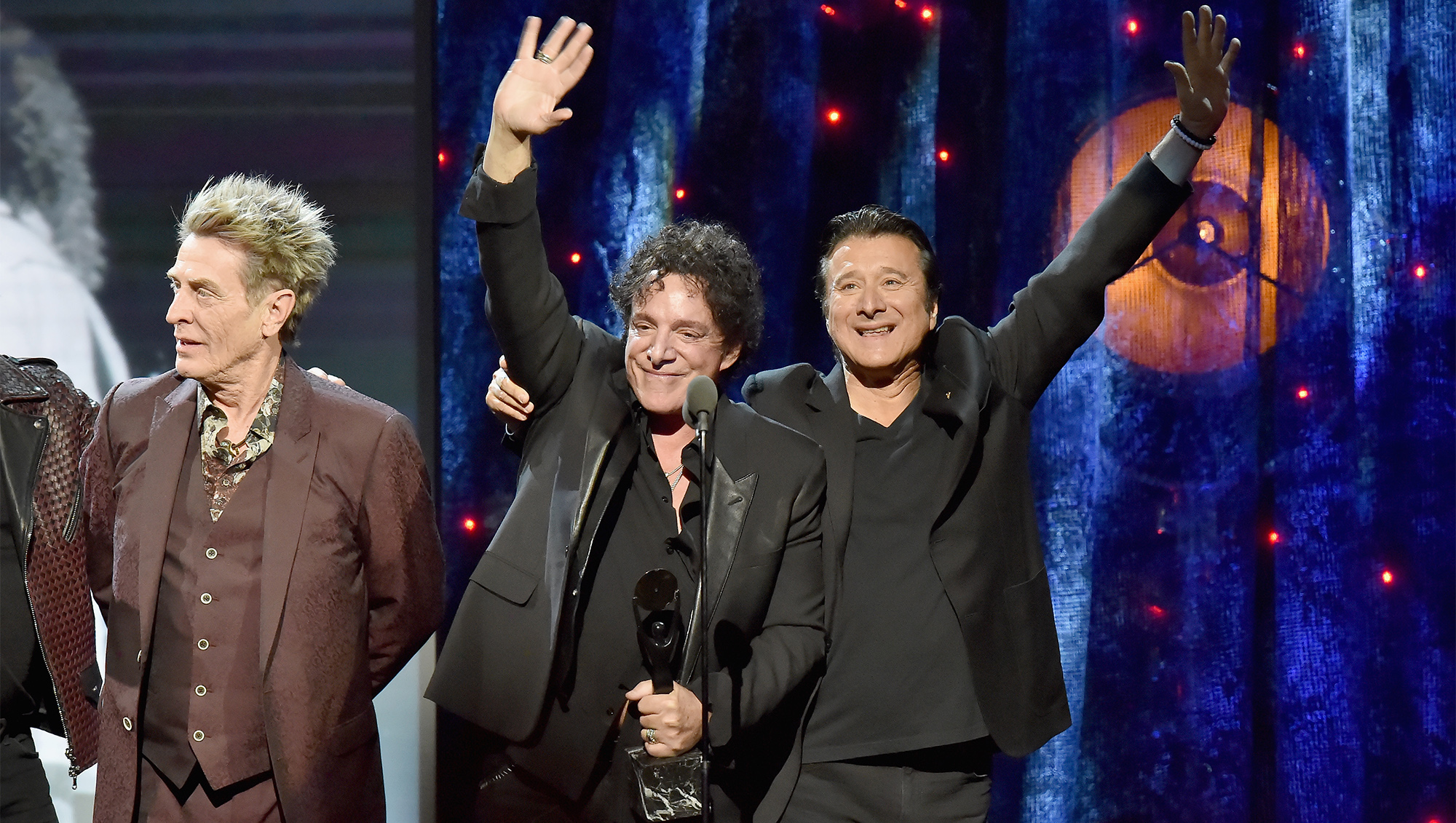 NEW YORK, NY - APRIL 07: (L-R) Inductees Ross Valory, Neal Schon, and Steve Perry of Journey onstage at the 32nd Annual Rock &amp; Roll Hall Of Fame Induction Ceremony at Barclays Center on April 7, 2017 in New York City. The event will broadcast on HBO Saturday, April 29, 2017 at 8:00 pm ET/PT