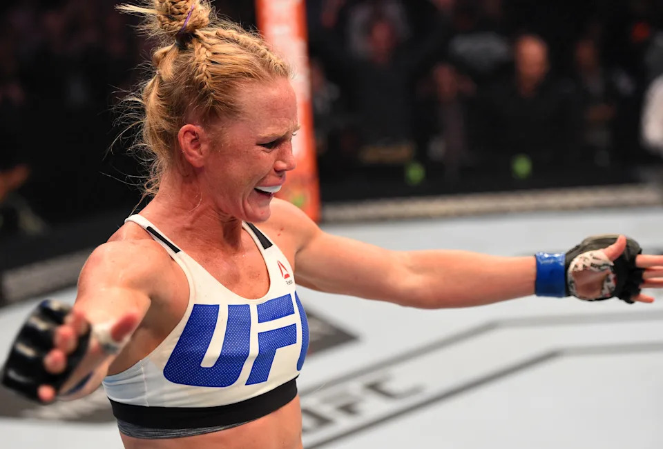 MELBOURNE, AUSTRALIA - NOVEMBER 15:  Holly Holm of the United States celebrates after her knockout victory over Ronda Rousey of the United States in their UFC women's bantamweight championship bout during the UFC 193 event at Etihad Stadium on November 15, 2015 in Melbourne, Australia. (Photo by Josh Hedges/Zuffa LLC/Zuffa LLC via Getty Images)