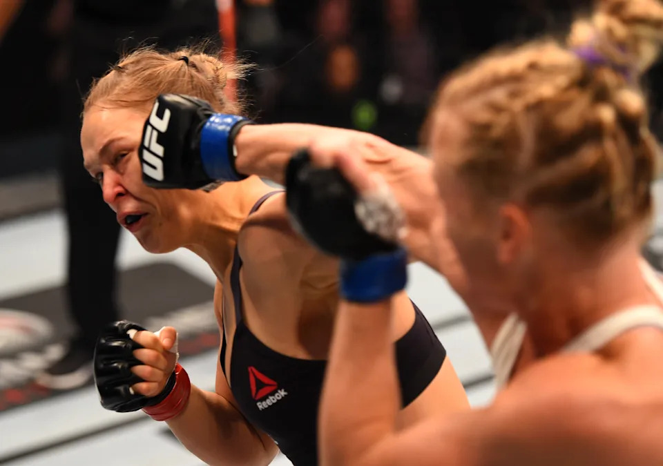 MELBOURNE, AUSTRALIA - NOVEMBER 15:  (R-L) Holly Holm of the United States punches Ronda Rousey of the United States in their UFC women's bantamweight championship bout during the UFC 193 event at Etihad Stadium on November 15, 2015 in Melbourne, Australia. (Photo by Josh Hedges/Zuffa LLC/Zuffa LLC via Getty Images)