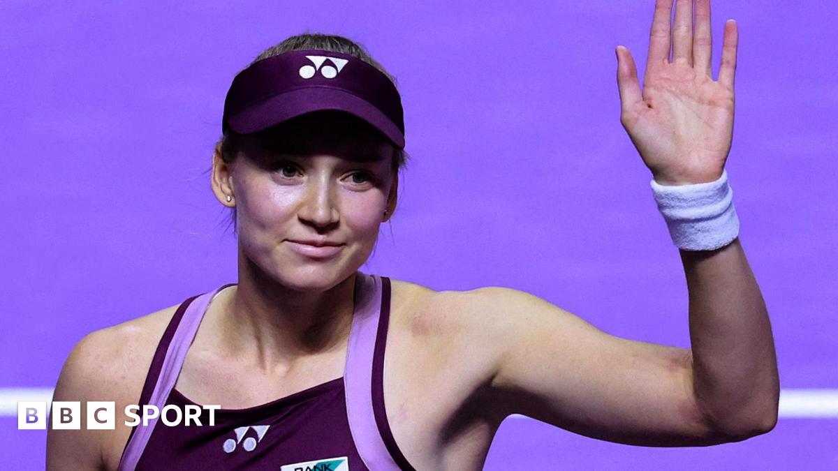 Elena Rybakina waves to the crowd at the WTA Finals