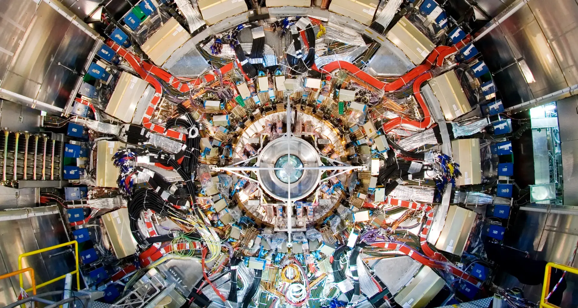 ATLAS detector end-cap being installed inside the Large Hadron Collider. The end-cap extends tracking coverage for particles moving at shallow angles to the beam