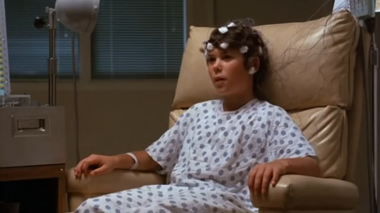 David (Joey Cramer) wearing scientific equipment in Flight of the Navigator