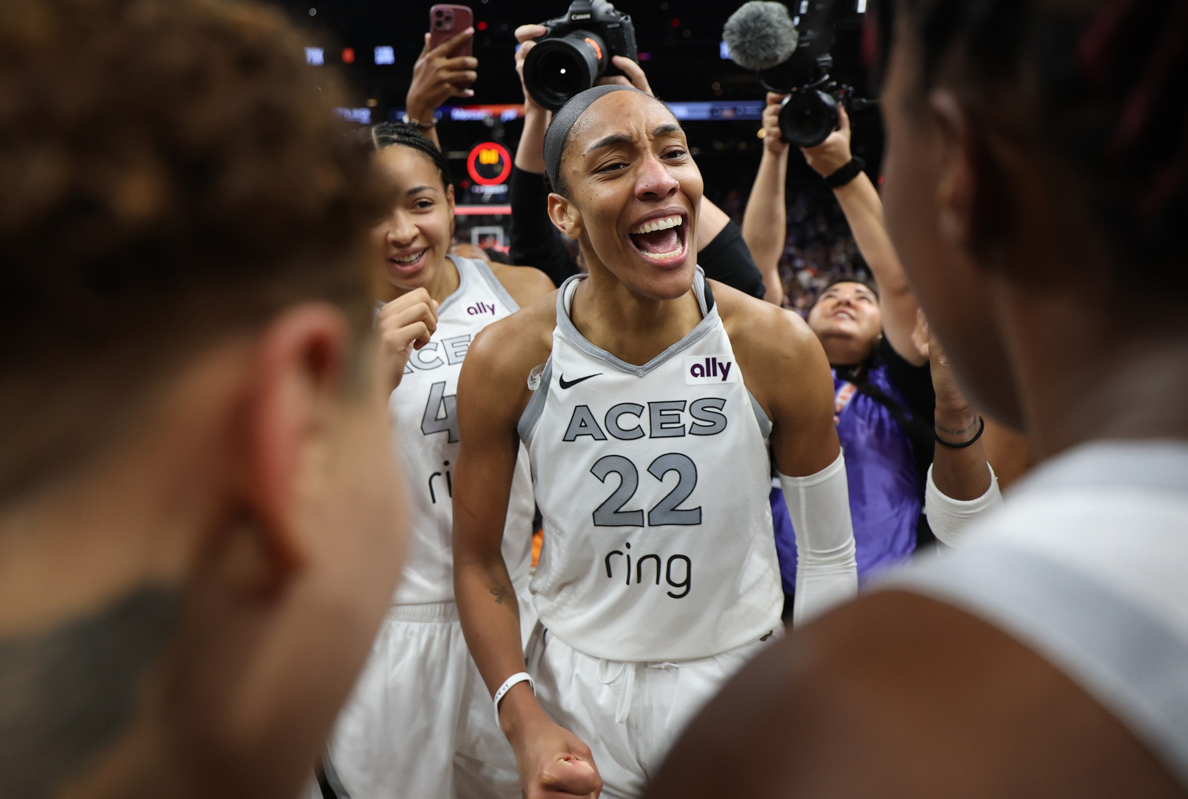PHOENIX, ARIZONA - OCTOBER 10: A’ja Wilson #22 of the Las Vegas Aces celebrates after winning Game Four of the 2025 WNBA Playoffs finals at Mortgage Matchup Center on October 10, 2025 in Phoenix, Arizona. The Las Vegas Aces defeat the Phoenix Mercury 97-86 to win the championship. NOTE TO USER: User expressly acknowledges and agrees that, by downloading and or using this photograph, User is consenting to the terms and conditions of the Getty Images License Agreement. (Photo by Christian Petersen/Getty Images)