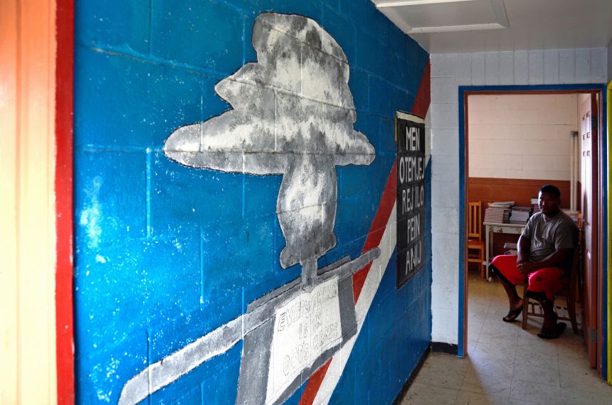 A painting of a mushroom cloud drawn by an American teacher with a message 