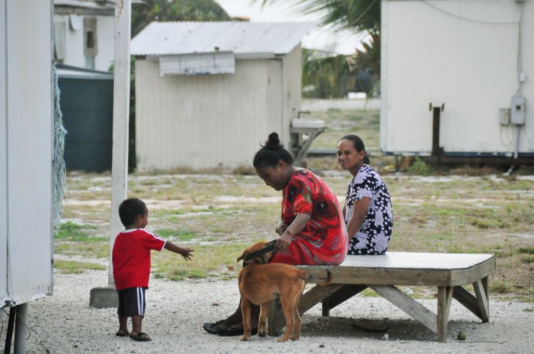 Members of a family of an unidentified worker on the Marshall Islands atoll of Rongelap are pictured in March 2014. Rongelap was severely affected by nuclear fallout from the 1954 US hydrogen bomb test on Bikini Atoll.