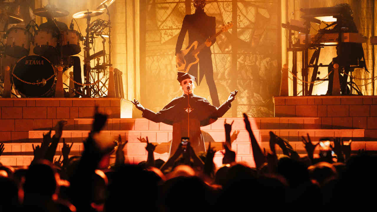 Ghost performing onstage in 2019