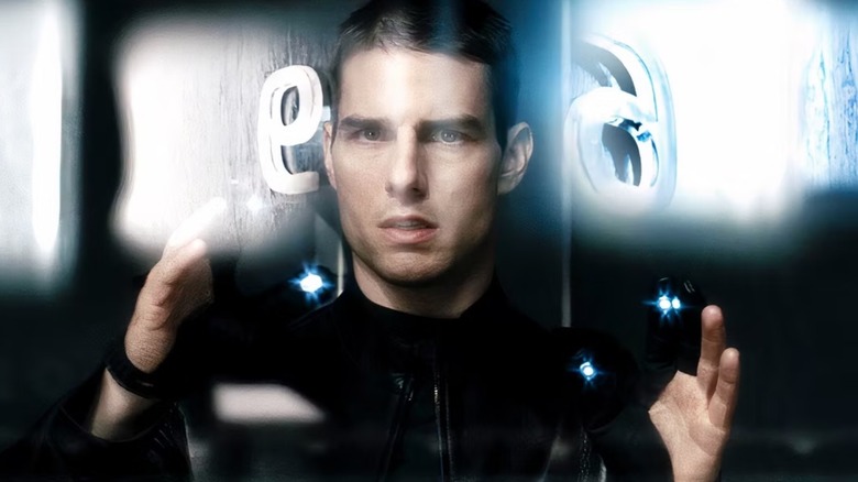 John Anderton (Tom Cruise) looking at an image of a door number in Minority Report