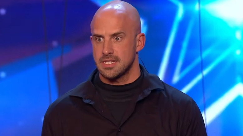 Jonathan Goodwin talking on stage on America's Got Talent: Extreme