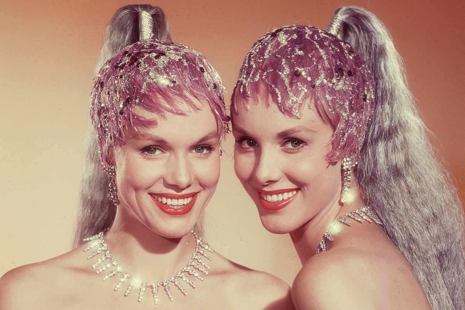 Twin sisters who worked with Frank Sinatra die on same day at 89