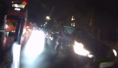 Motorist drives towards cyclists in cycle lane, Lower Road towards Surrey Quays, London