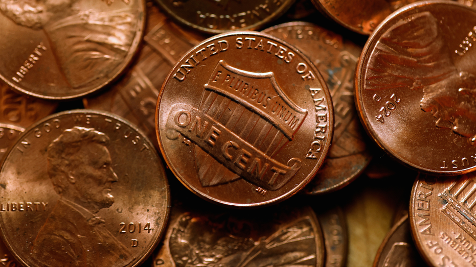 A stack of layered pennies are seen.