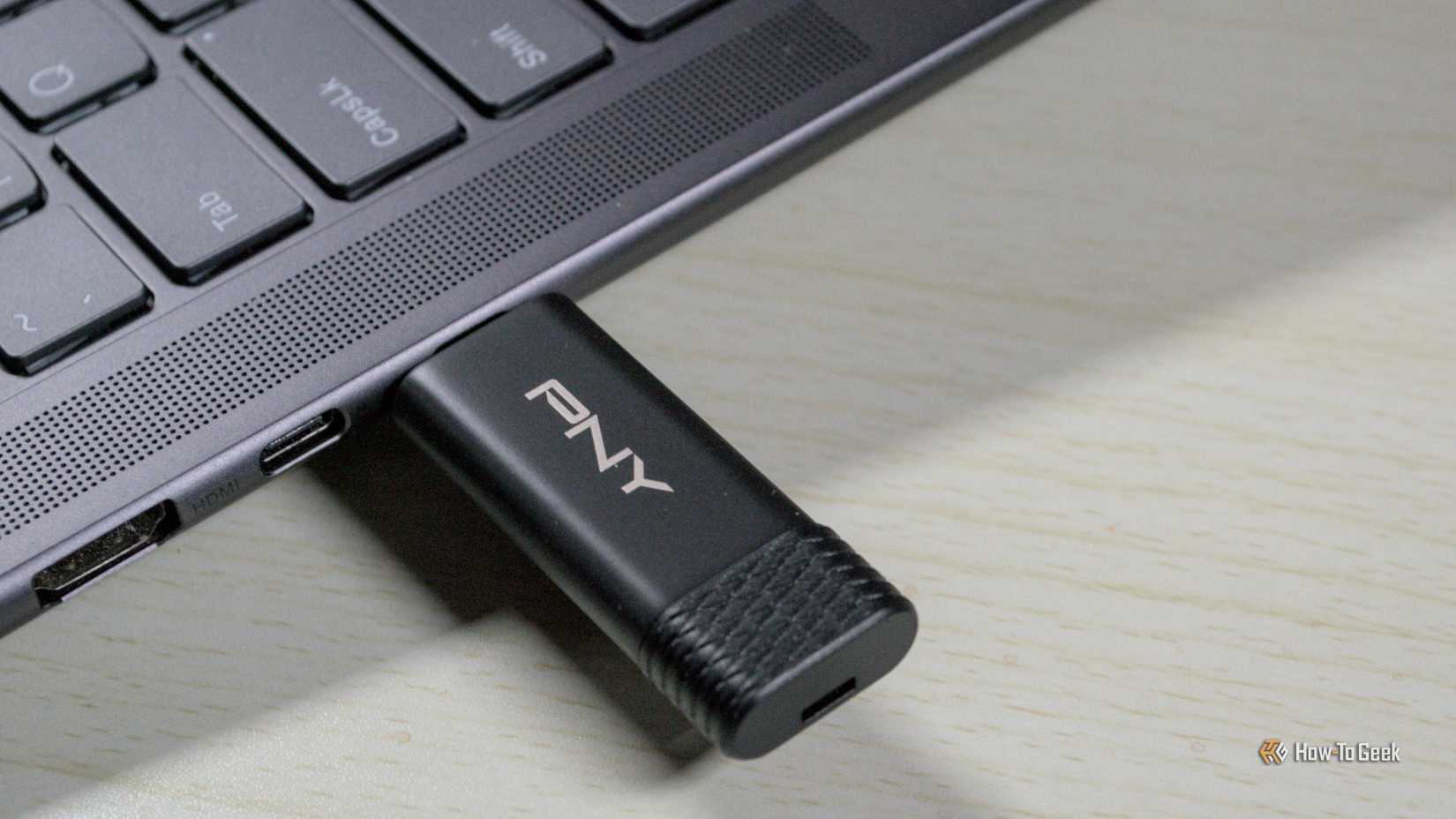 PNY Pro Elite V3 plugged into the USB-C 3.2 port on a laptop.