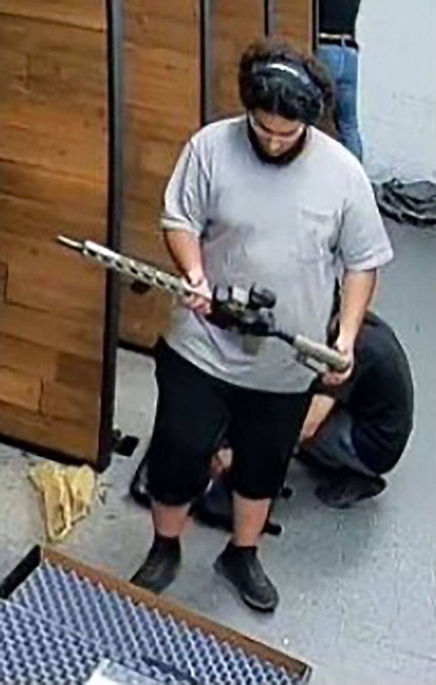 Mohmed Ali is seen at Downriver Guns on September 25, 2025, according to a criminal complaint released by the United States District Court for the Eastern District of Michigan