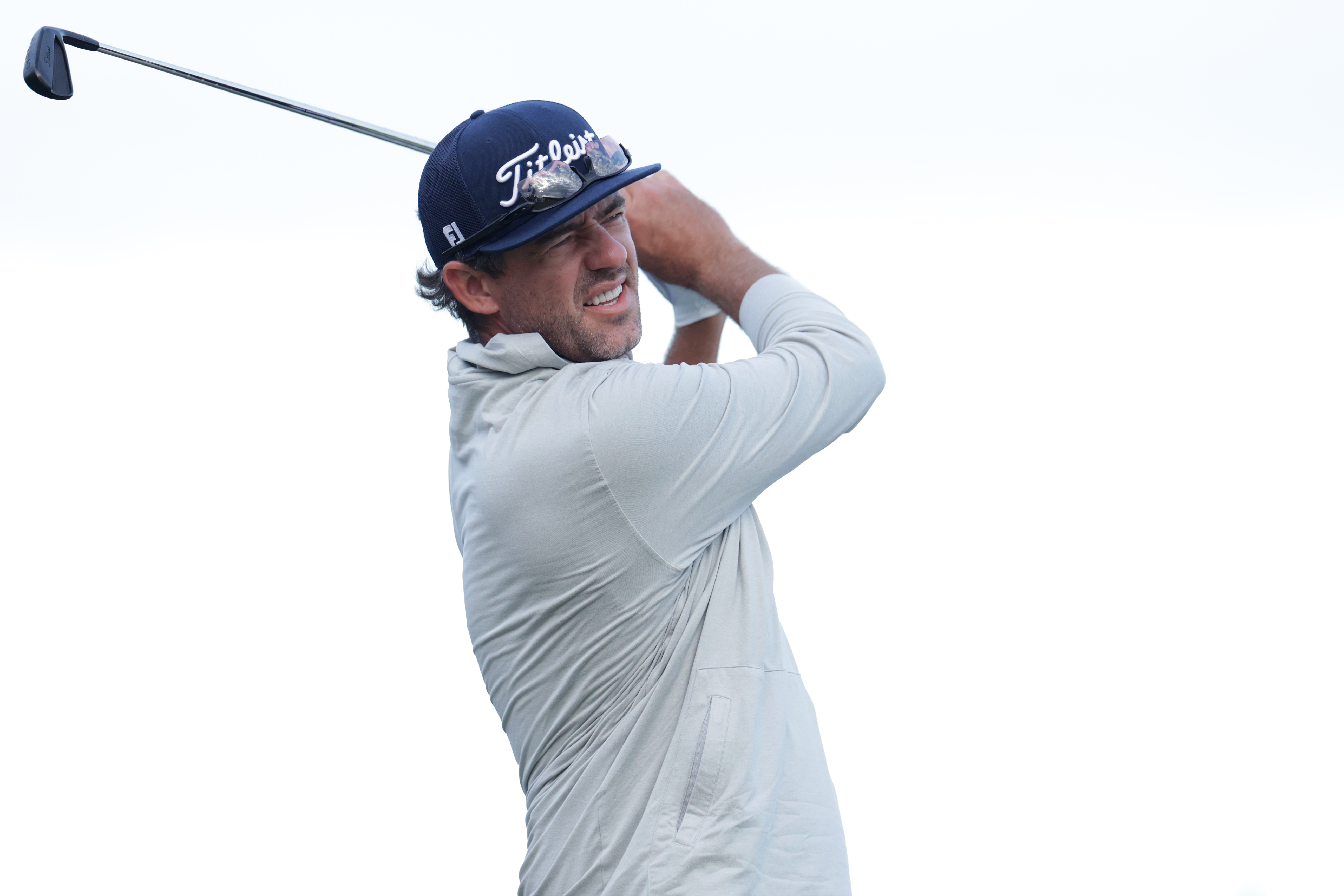 Lanto Griffin hits an iron shot