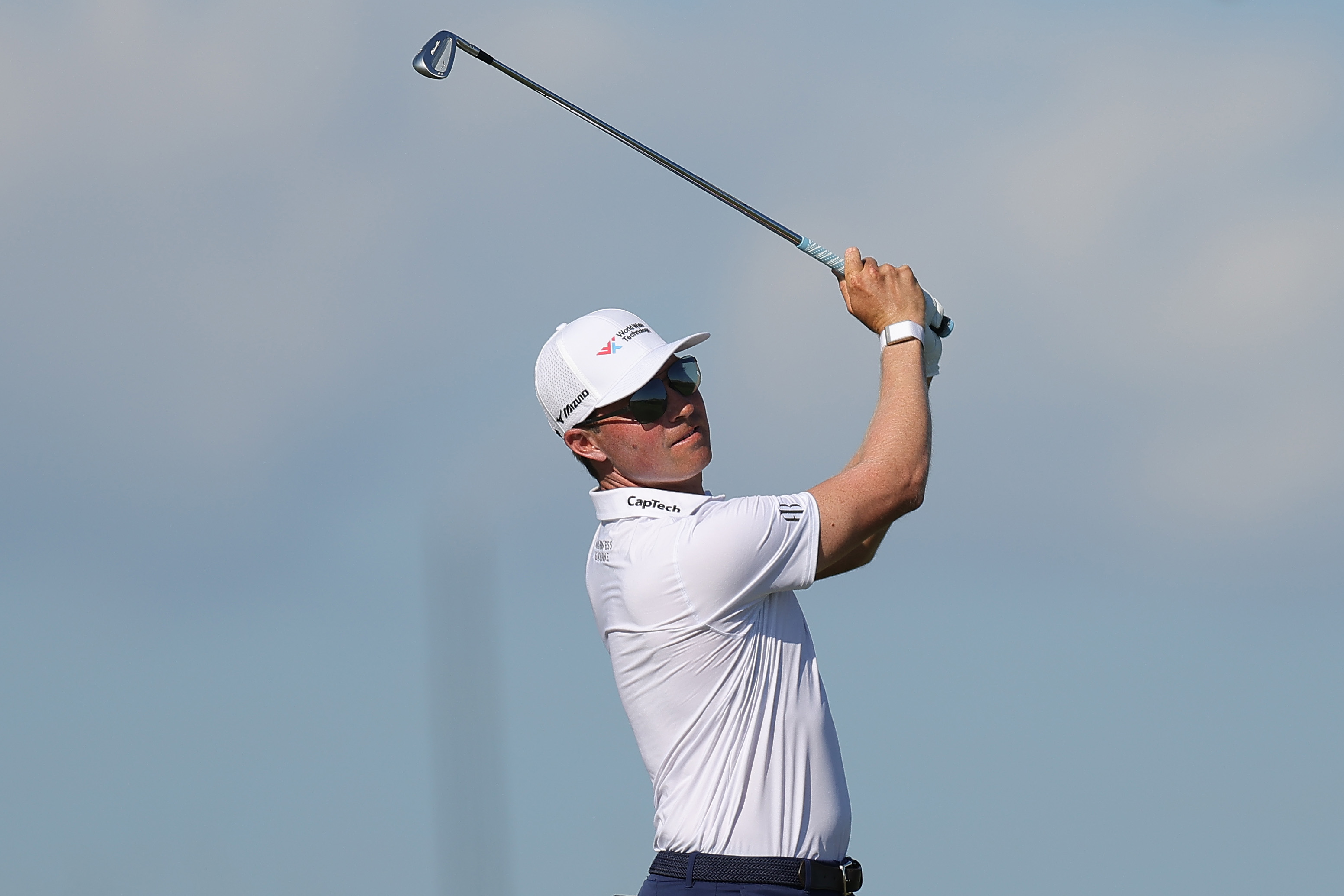 Ben Griffin hits an iron shot