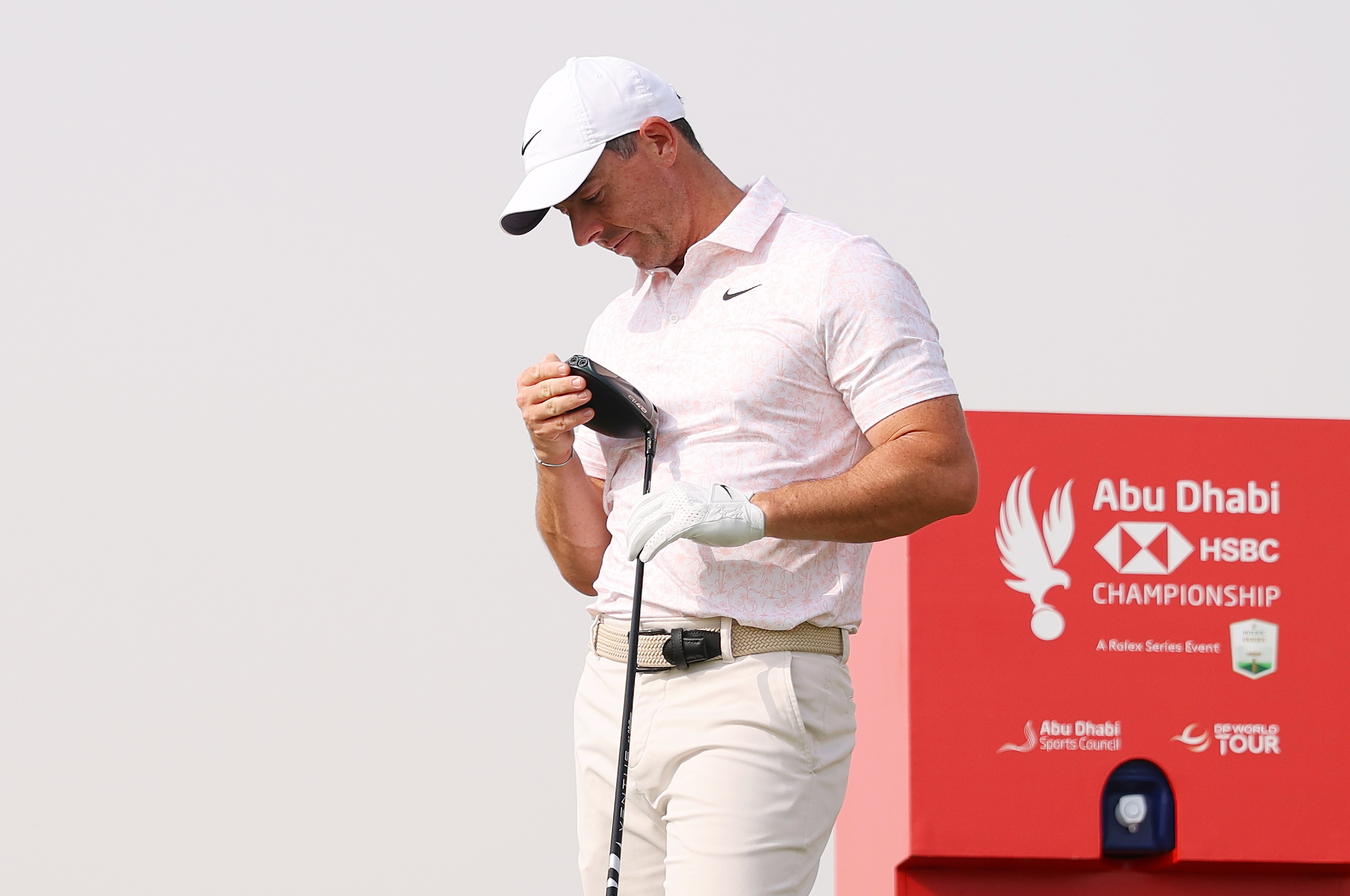 Rory McIlroy examines his new TaylorMade Qi4D driver
