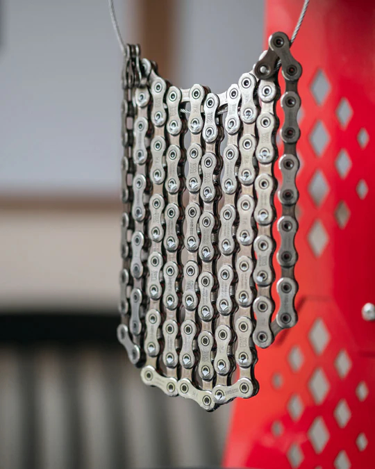 A chain hang-drying after being treated with Silca chain wax