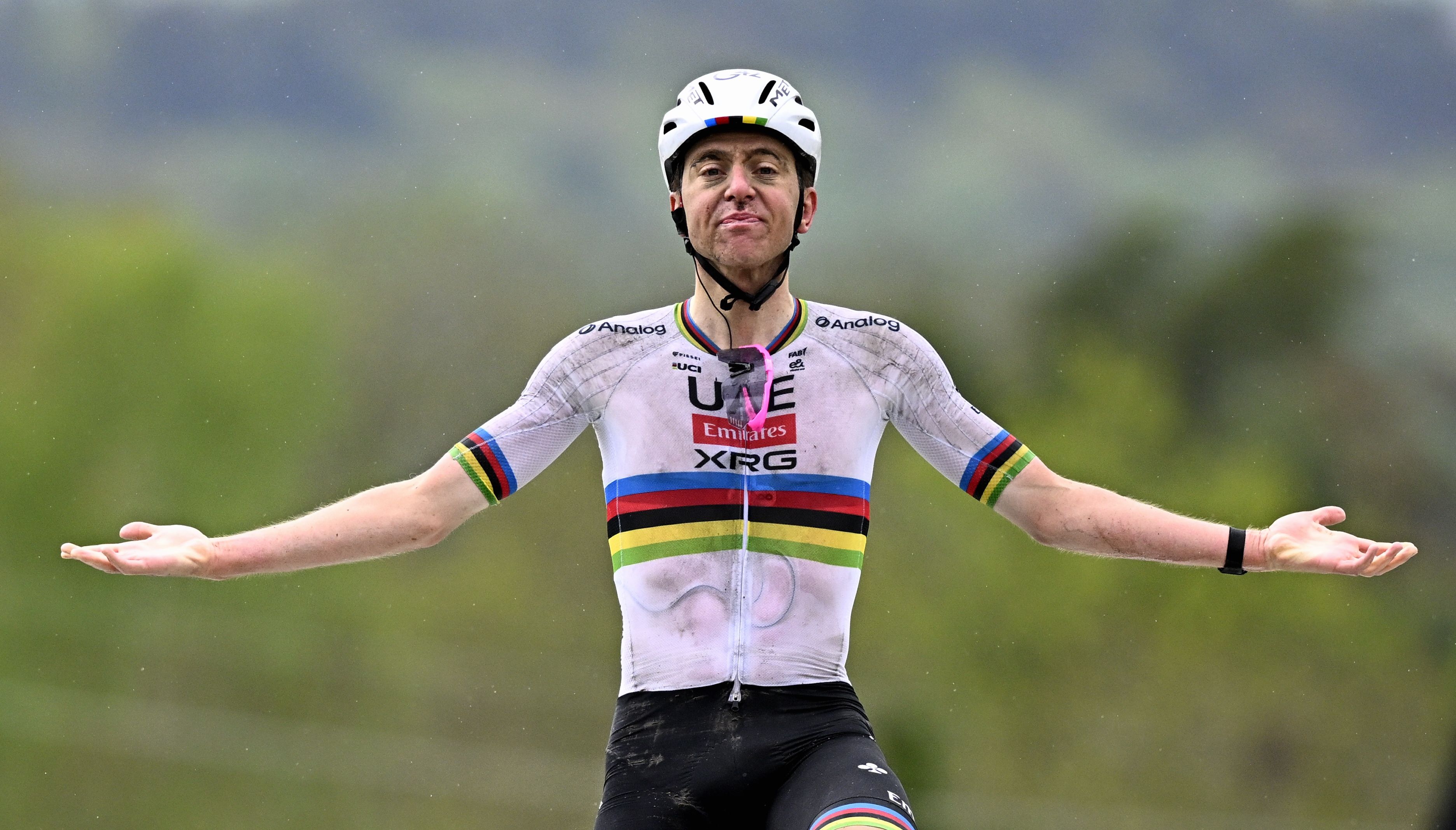 Tadej Pogacar of UAE Team Emirates celebrates after winning the men's race of 'La Fleche Wallonne' one-day cycling race.