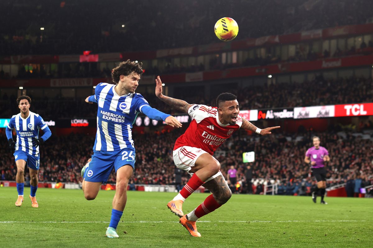 Gabriel Jesus goes down under a challenge from Ferdi Kadioglu