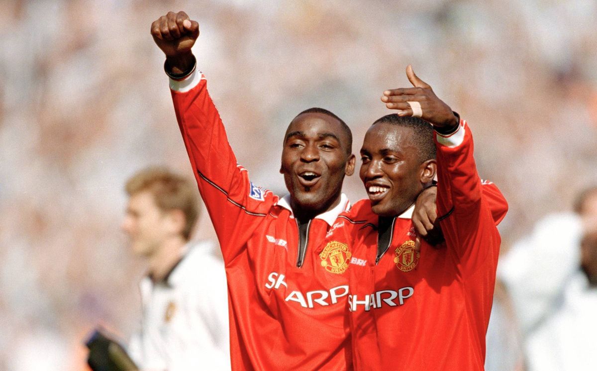 Andy Cole (left) and Dwight Yorke of Manchester United celebrate after the final whistle of the FA Cup Final between Manchester United and Newcastle United
