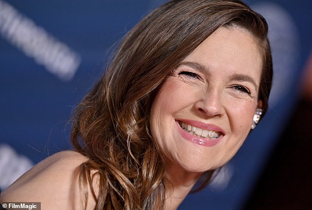 The star, pictured April, went makeup-free in her latest video