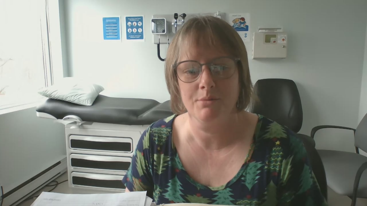 Woman seated in clinical office