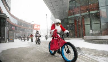 Santa, other cyclists brave nasty weather to spread goodwill, supplies – Winnipeg Free Press