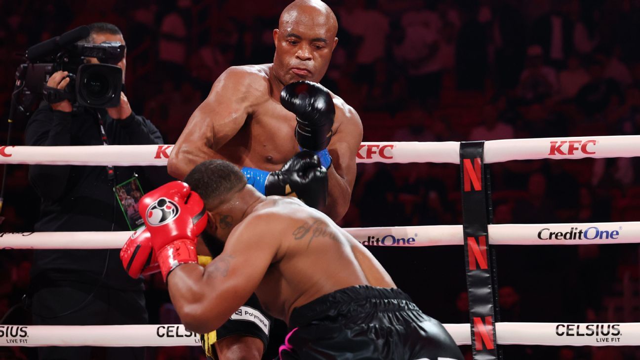 Anderson Silva drops Tyron Woodley, rolls to 2nd-round TKO win
