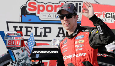 Brad Keselowski stands with his trophy in Victory Lane after winning the NASCAR Xfinity Series auto race at Darlington Raceway, Saturday, Sept. 1, 2018, in Darlington, S.C. (Terry Renna/AP)