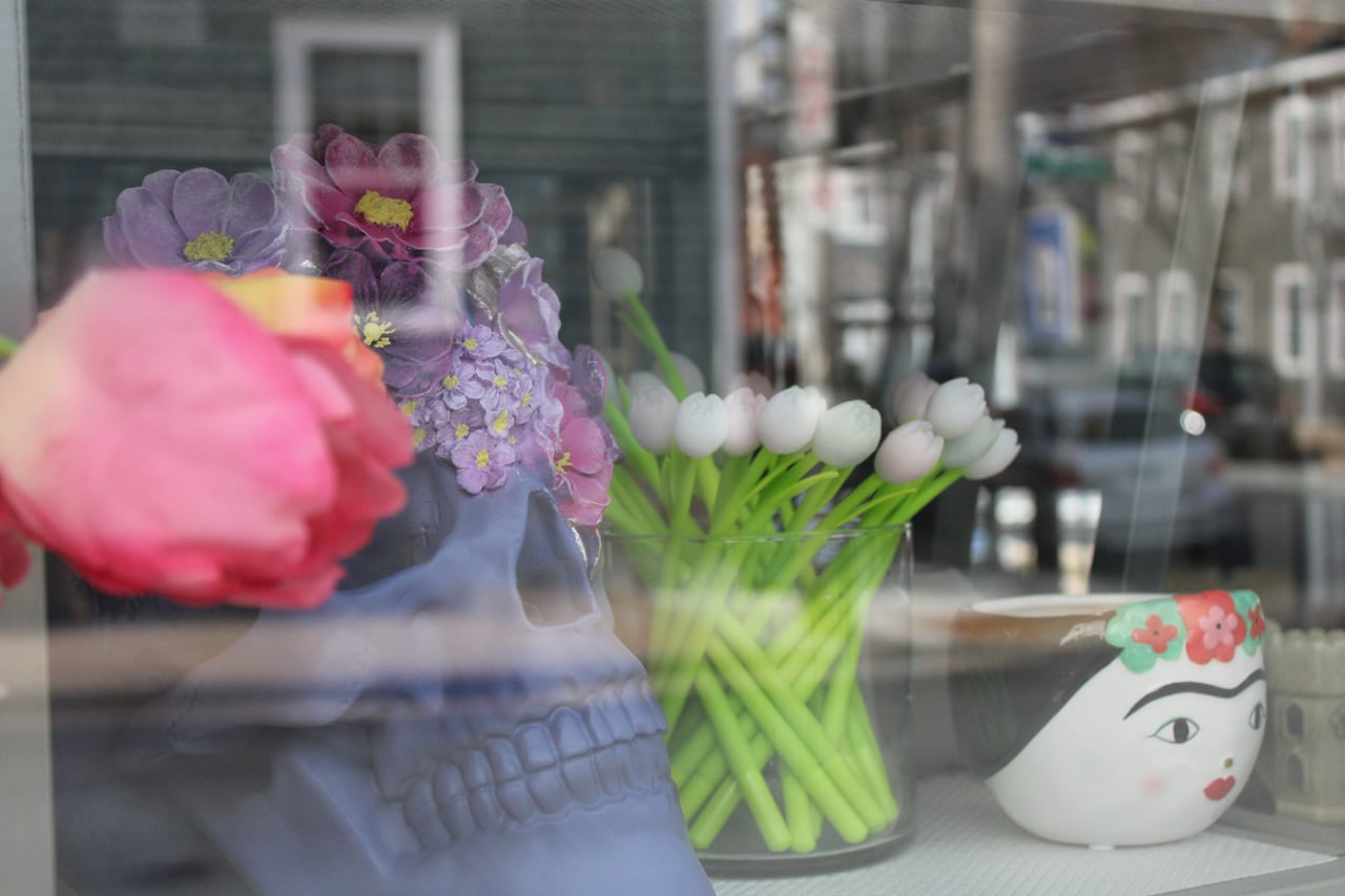 window display with skull and flowers