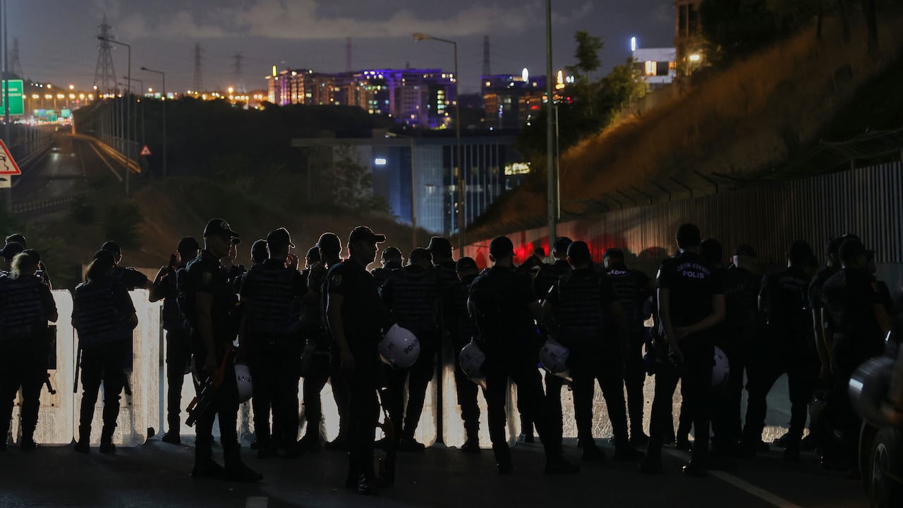Police officers stand guard in Istanbul