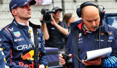 Max Verstappen in team pit area.