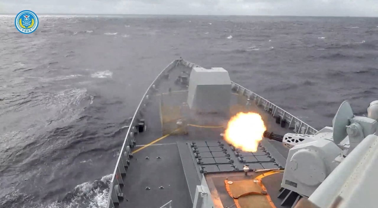 A ship appears to fire a weapon in this screengrab from a video.