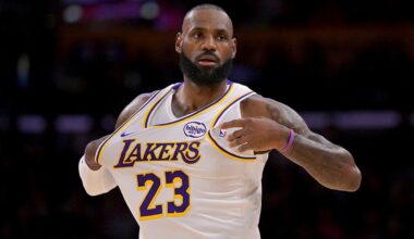 LeBron James draws criticism for 'golf swing' during national anthem