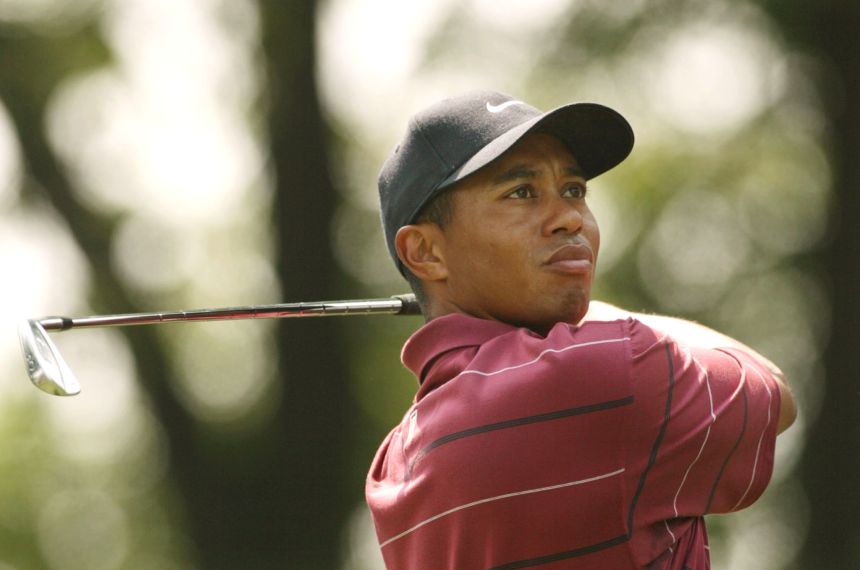 Woods watches a tee shot during the 2002 US Open.